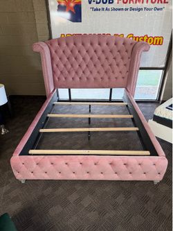 Pink upholstered queen bed frame