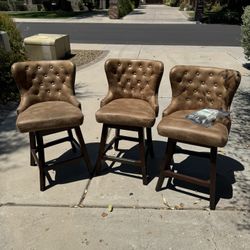 Leather Swiveling Bar Stools (3)