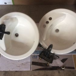 Two  Bathroom Sinks 