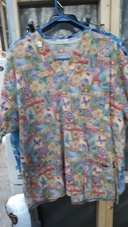 Small to medium size scrub shirt