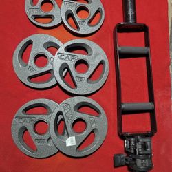 2" HOLE  OLYMPIC PLATES 50LBs.   4-10s. 2-5s.  AND  TRICEP BAR 
11525 S HALSTED DUNKIN DONUTS/7111.S WESTERN WALGREENS 
70$  CASH ONLY AS IS 