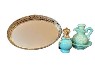 Vintage perfume bottles and mirror tray