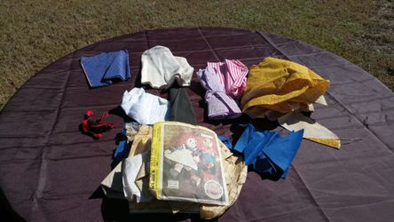 Raggedy Ann sewing pattern and material to make a stuffed doll