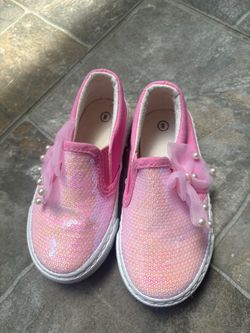 Zapatillas slip-on rosadas con lentejuelas y lazo para niñas talla 8