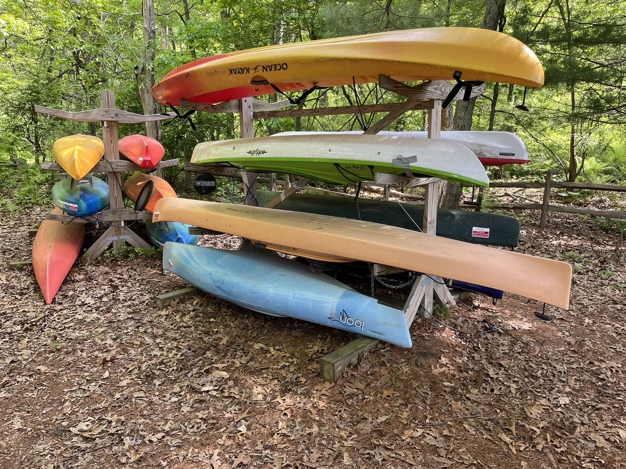 Heritage Merlin 14’ touring Kayak With Overnight Storage (Second From The Bottom )