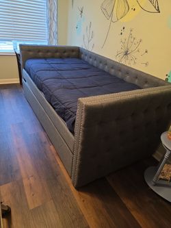 Bed with mattresses