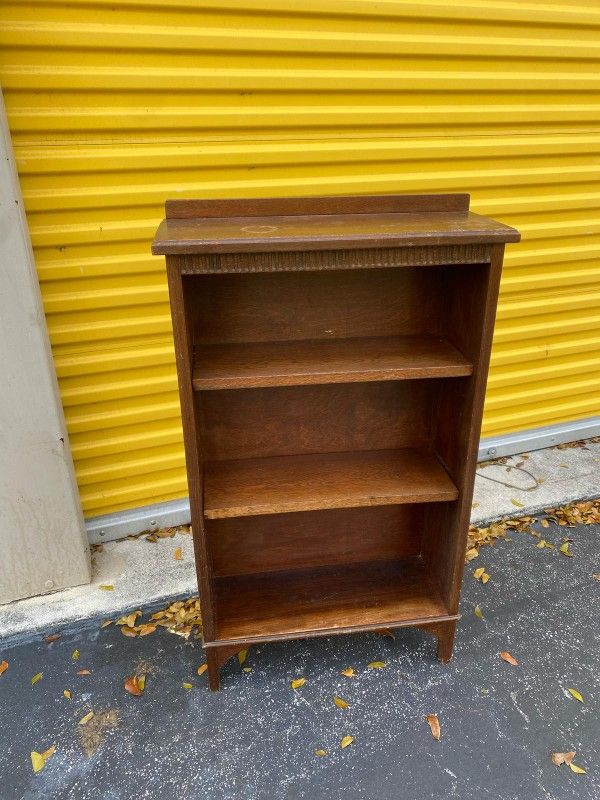 Antique art deco bookcase in solid oak.