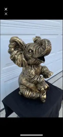 Large golden elephant statue