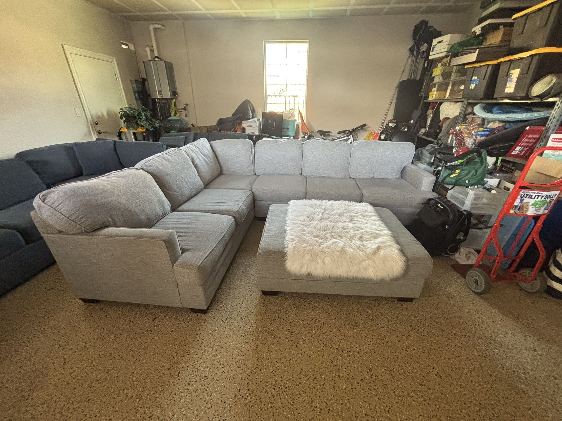 Living Spaces Sectional With Ottoman
