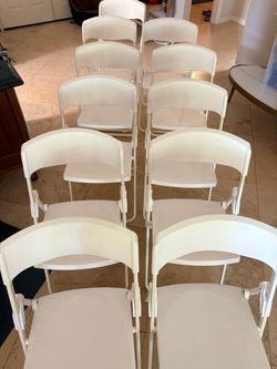 11 White Folding Chairs