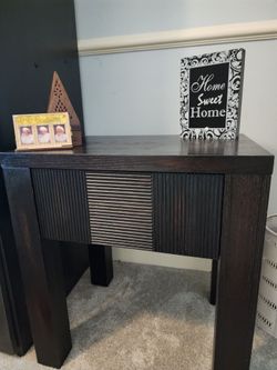 Espresso set of wooden side tables.