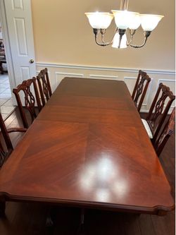Dining table and 8 chairs
