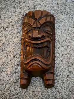 Hanging Hawaiian Tiki. Cement Construction.