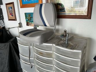 Boat seat fold up with the swivel brackets  brand new the seat fold over