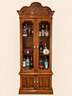 Solid oak cabinet with ornate details