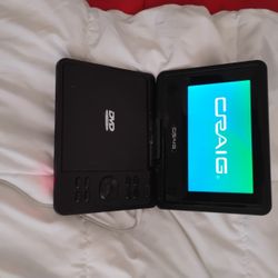 Craig DVD player Comes With Charger And Movies Asking 25$