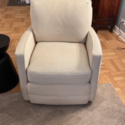 Two Swivel Club Chairs