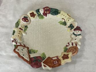 World Bazaars Hand-painted ceramic holiday serving plate with gingerbread and snowman motifs. 12”