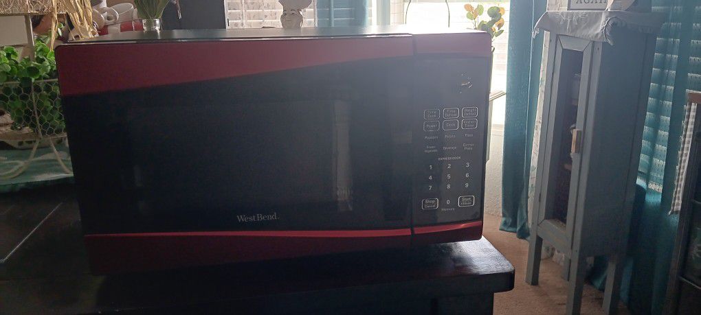 Red westbend microwave oven $35 Obo