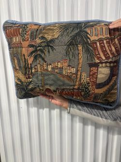 Two tapestry decorative zipper throw pillows. 20”  x 27”. $50 each