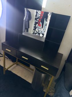 black and gold vanity
