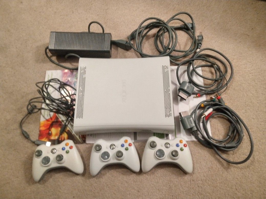 Xbox 360 with controllers and chords