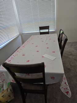 Dark Wood Dining Table 4 Chairs and bench plus couch