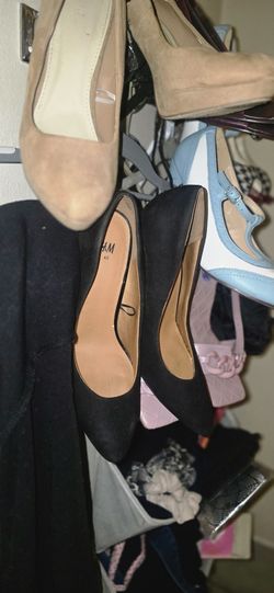 Two pairs of Pumps ( heels)  black 8.5.  ; tan 8