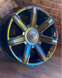 22" Escalade OEM Wheels , Gloss Black, Matte Black Inserts.