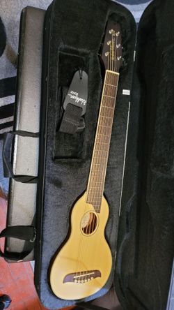 WASHBURN R010 ROVER STEEL STRINGS TRAVEL ACOUSTIC ELECTRIC GUITAR IN NATURAL COLOR.