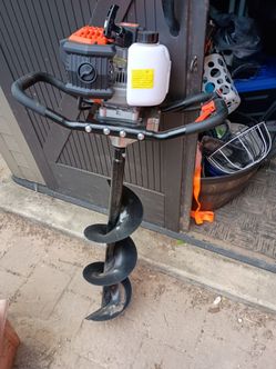 Auger post hole digger