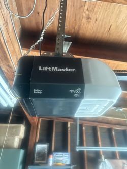 Garage Door Opener Spring Off Track Replace Adjustment And Parts
