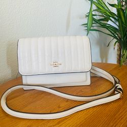 “Coach handbag.”