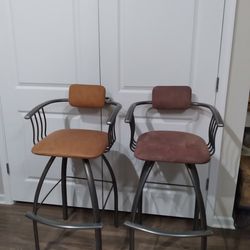 Two Swivel Counter Height  Chairs 
