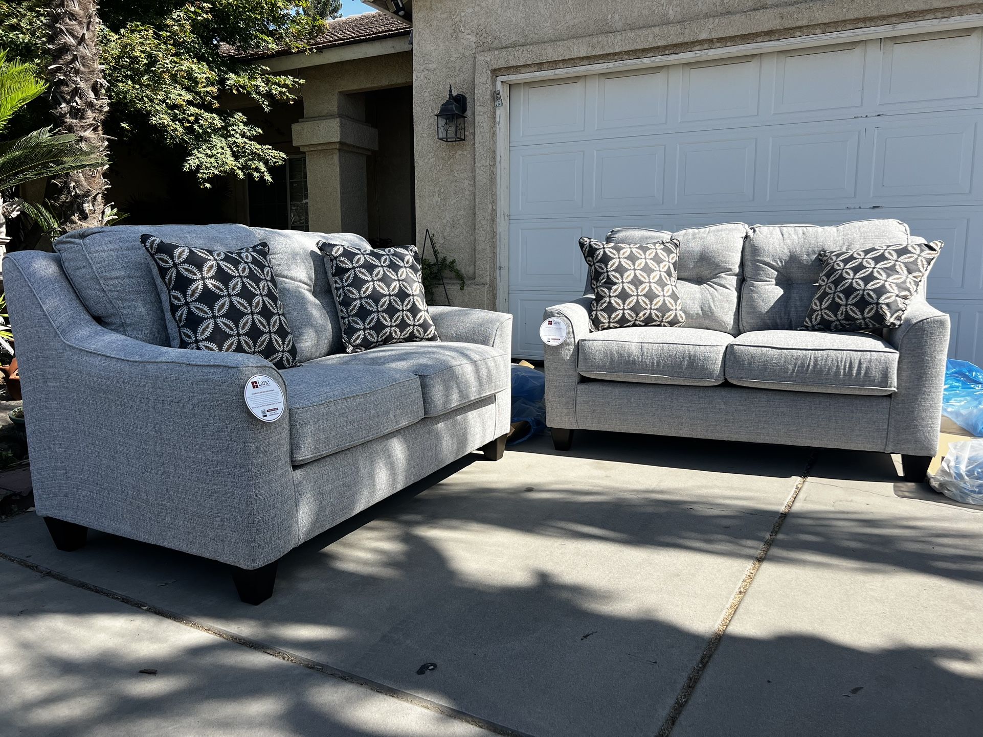 Brand New. (Set of 2) Lane Love Seat Sofa’s. Tweed color with accent pillows. $649