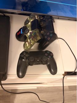 PS4 with 3 controllers and charger