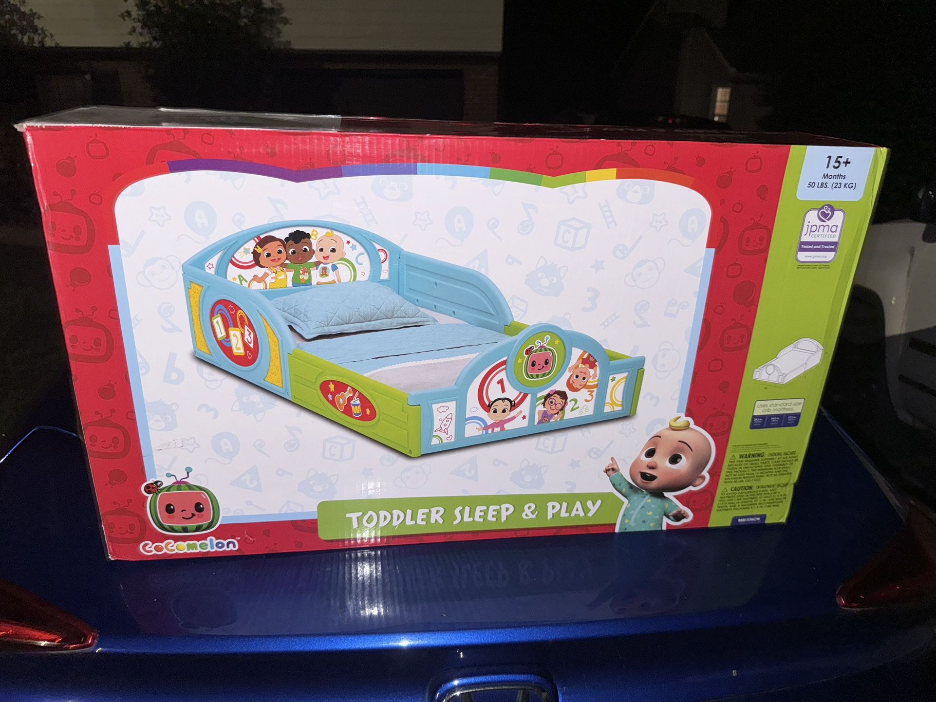 CoComelon Sleep and Play Toddler Bed with Built-In Guardrails by Delta Children, Blue/Multi