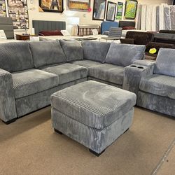 Corduroy gray sectional with ottoman