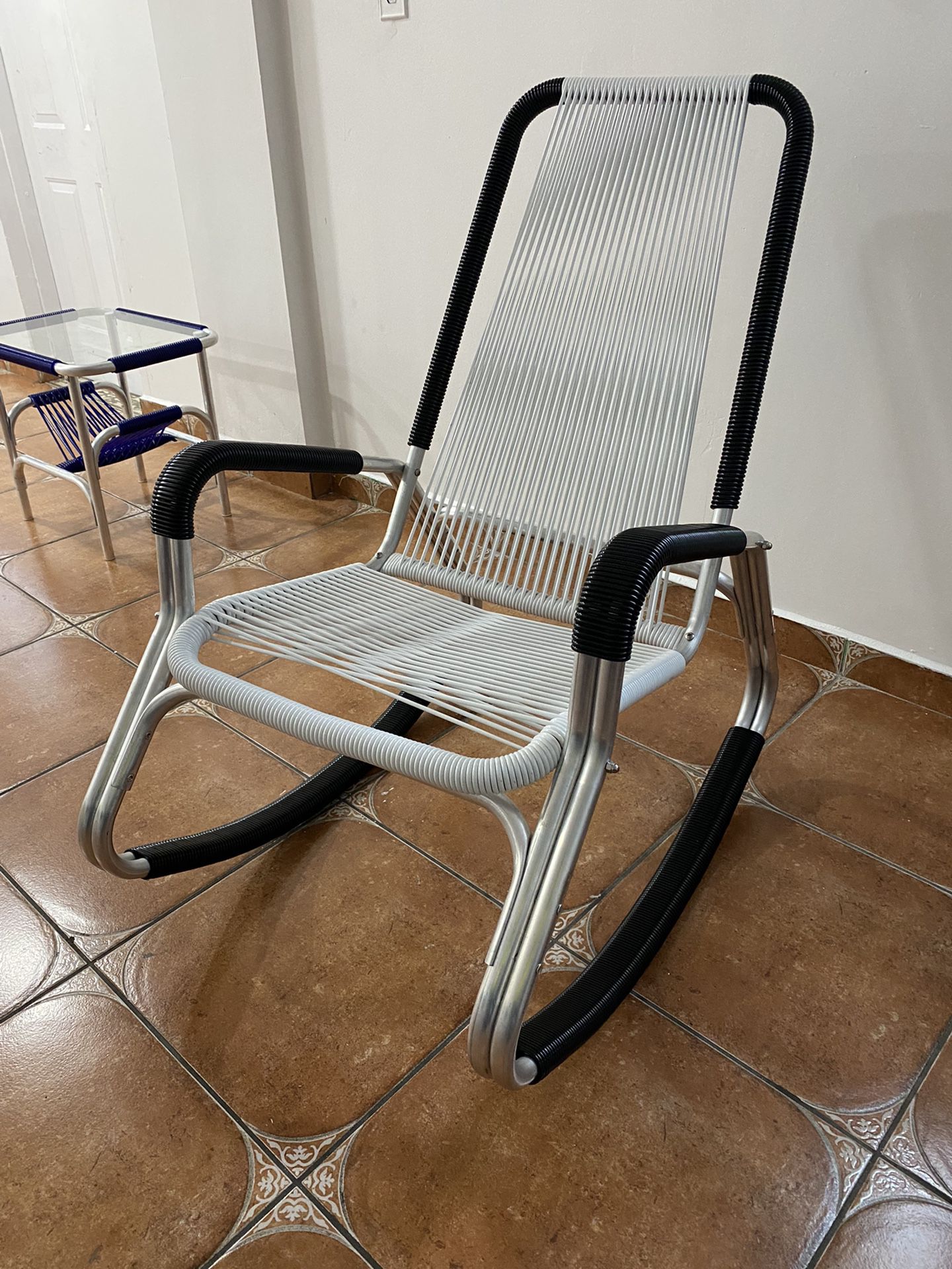 aluminum and Swiss PVC armchairs and stainless steel screws