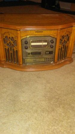 Radio with record player and manual