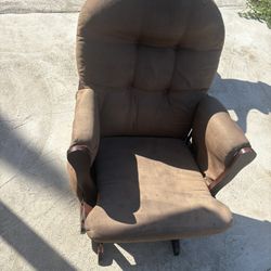 Brown upholstered glider chair rocking chair 