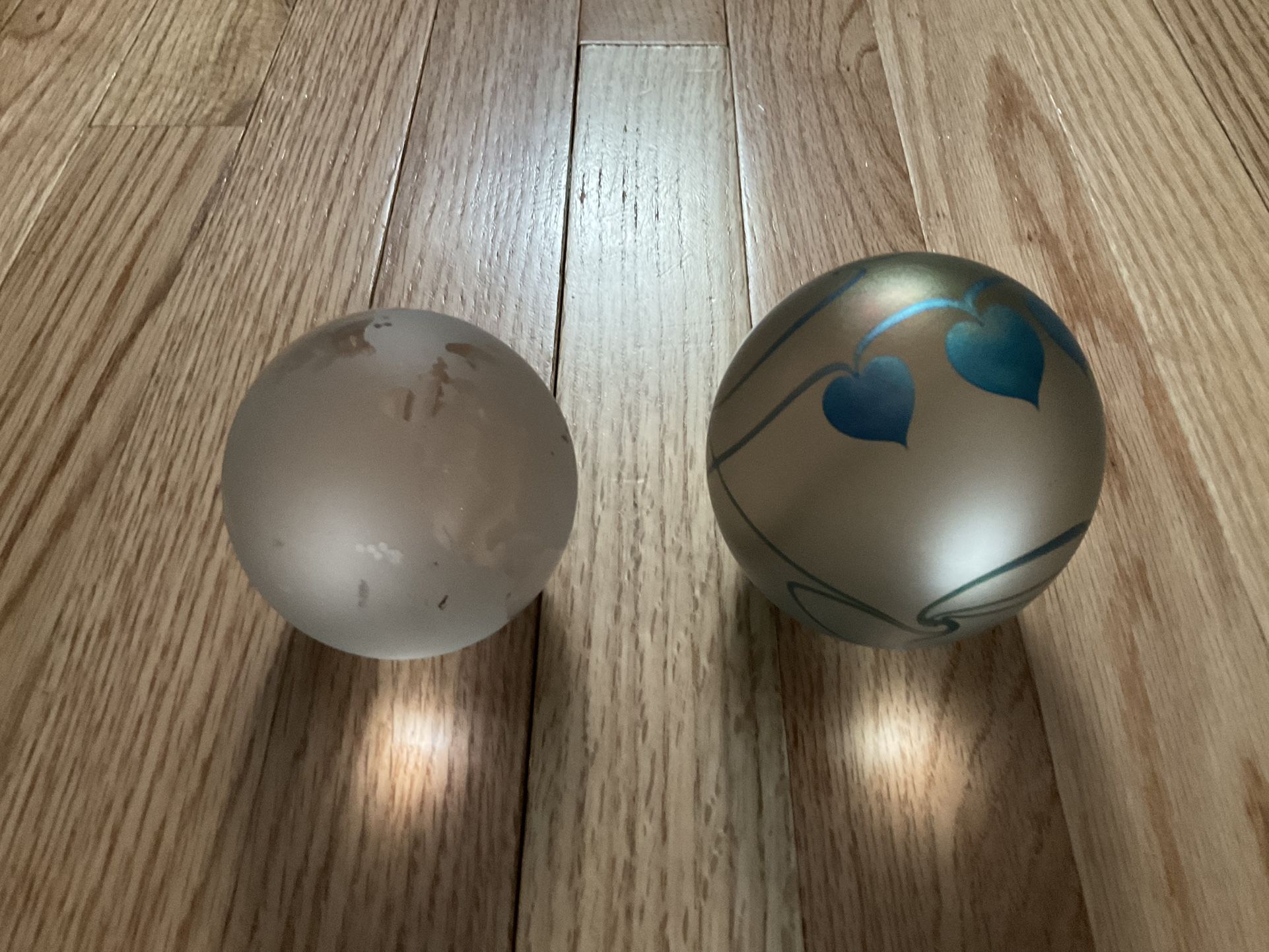 Set Of  2  Glass Orbs-about 3-4 Inches Round 