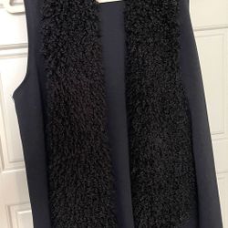 Never Worn - Melissa Paige- Black sleeveless open front cardigan sweater.  Fluffy around collar & down front.  L-XL