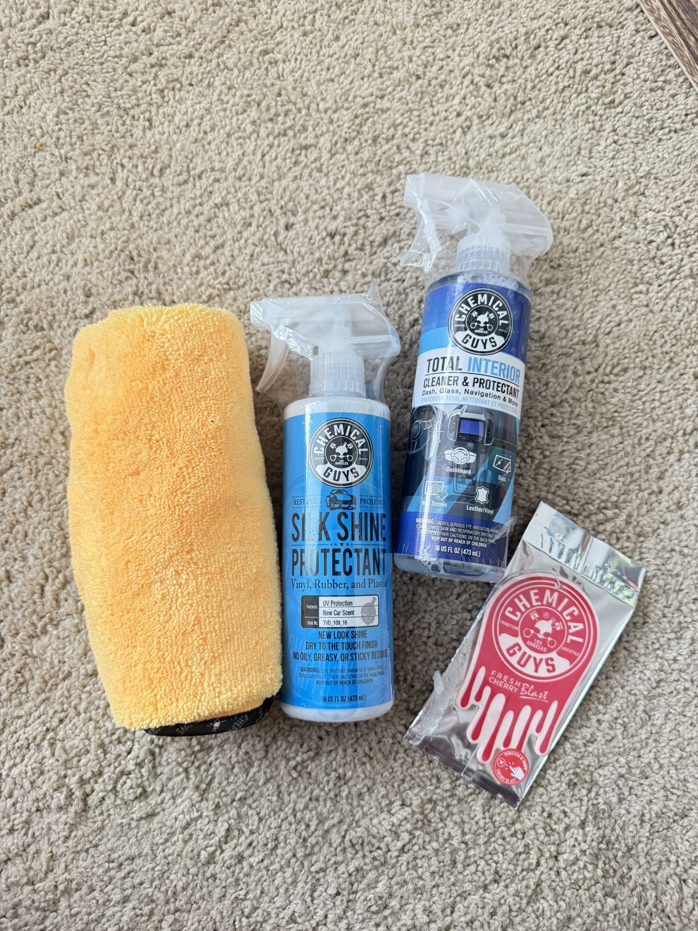 Chemical Guys Sprays, Microfiber Towel, and Car Freshener
