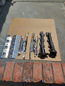Dodge Ram 5.7L Hemi Exhaust Manifolds with Hardware and Heat Shields