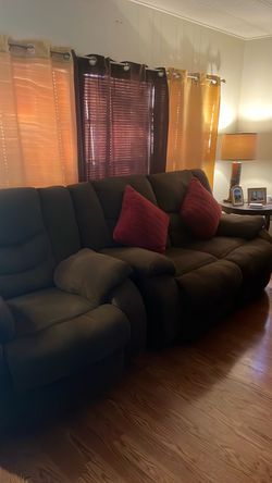 Brown living room set with reclinables