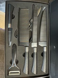 Knife set. Open box.