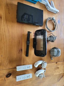 Nintendo Wii U with games.