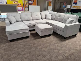 Large light gray modern sectional w/ ottoman
