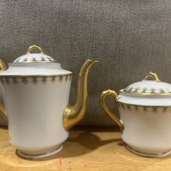 Haviland Limoges coffee pot and a covered sugar bowl